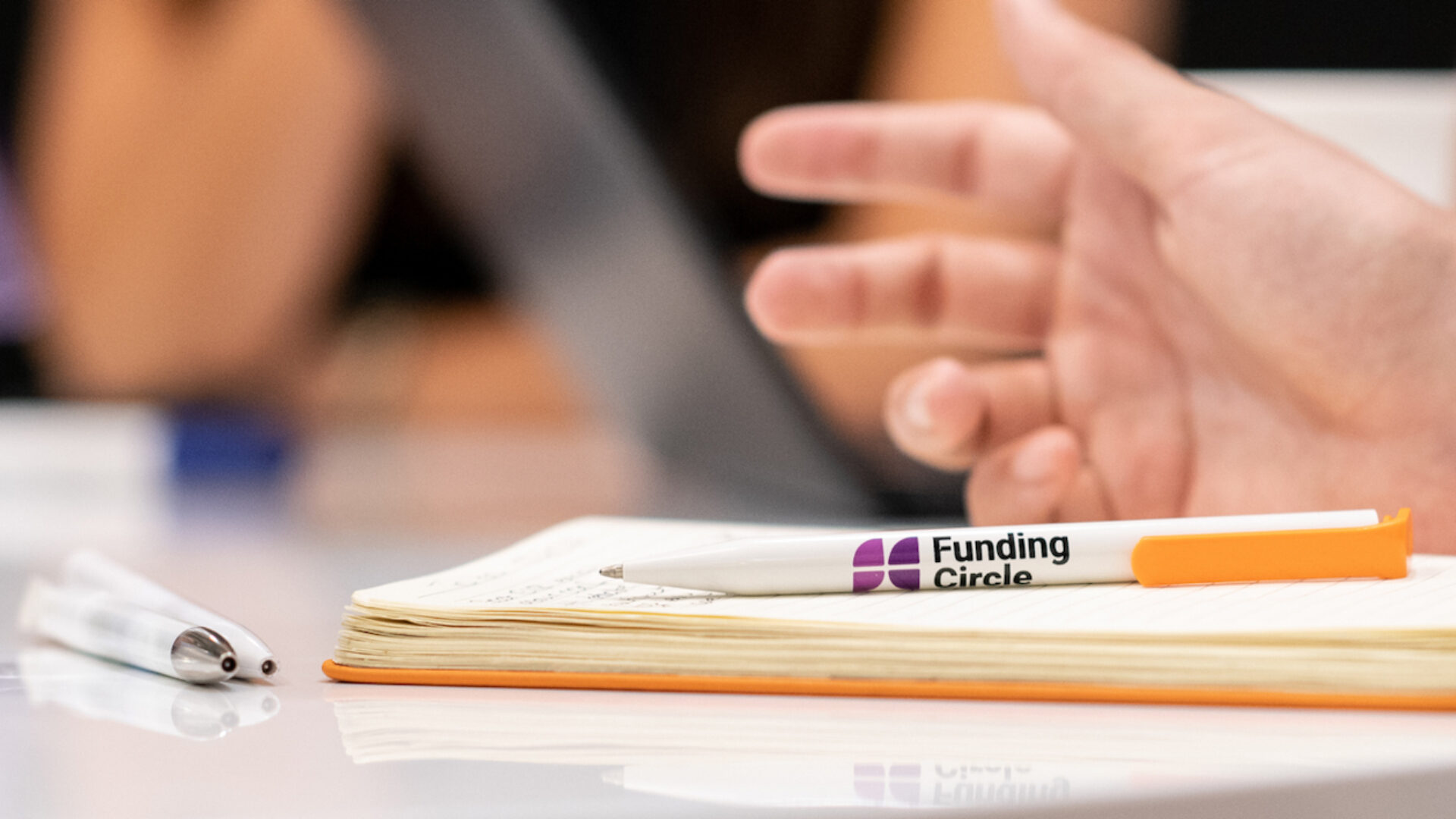 Funding circle pen on table alt